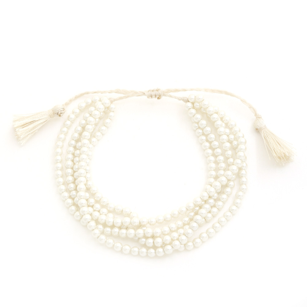 BEADED LAYERED TASSEL BRACELET